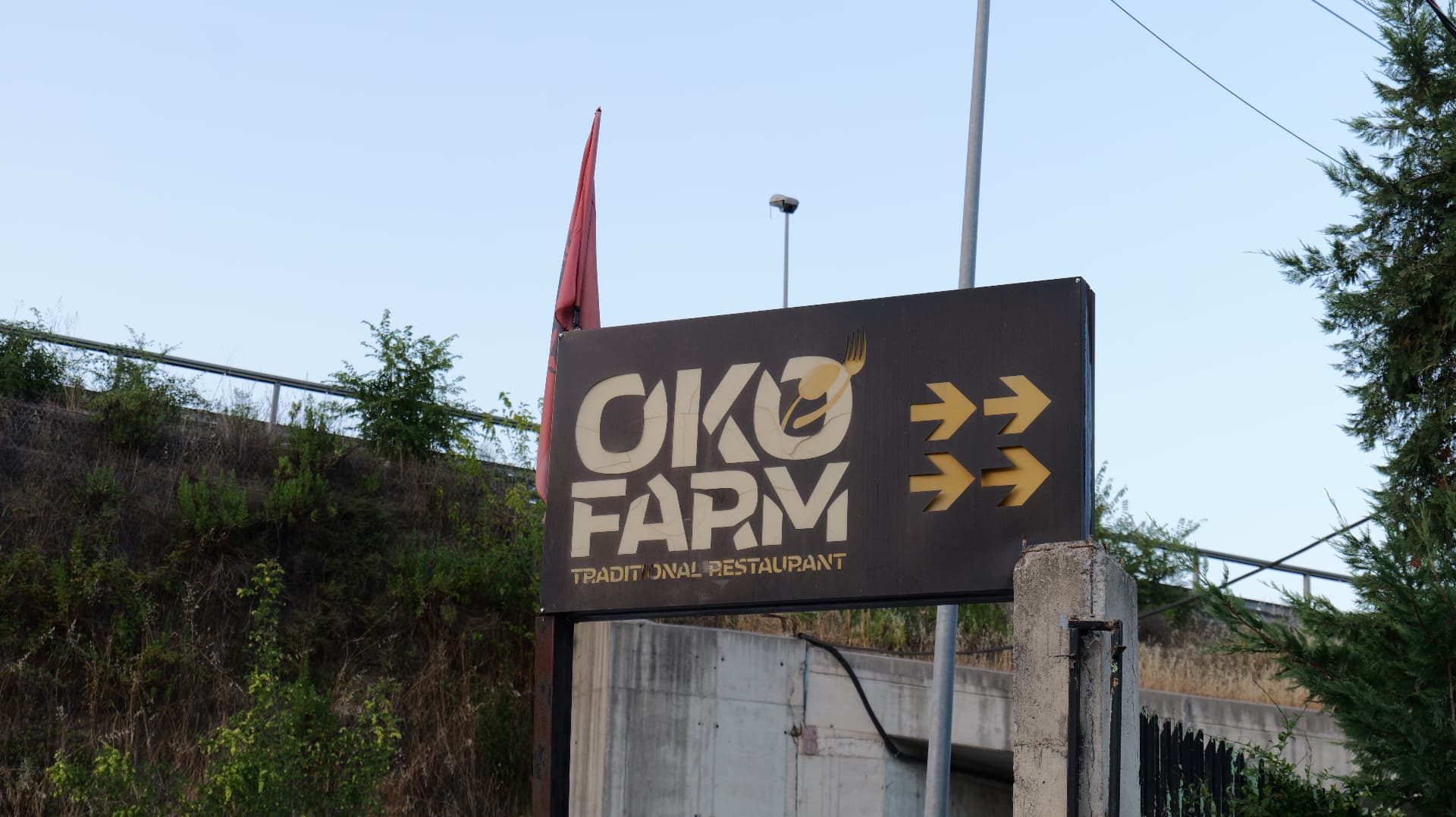 OKO Farm Traditional Restaurant road sign near the highway exit in Mullet